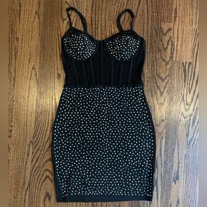 Black mini dress. Built in removable pads. Size small. Brand Banjul. Worn Once.